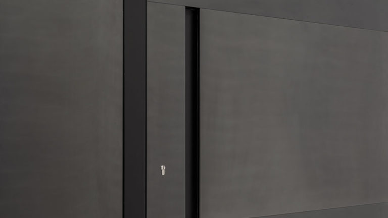 a black door with a lock